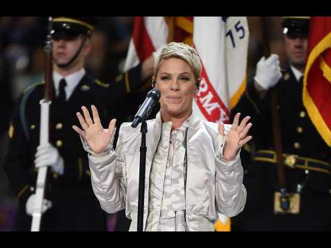 VIDEO : Pink defends throwing out throat lozenger at Super Bowl