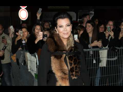 VIDEO : Kris Jenner faceplants into coffee table
