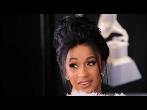 VIDEO : Cardi B?s Reacts To A Note From U2?s Bono