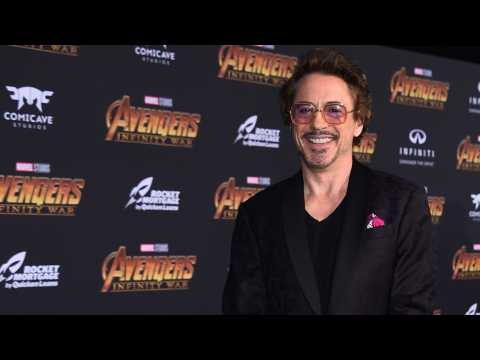 VIDEO : Robert Downey Jr. Gives Chris Evans A Captain America-Themed Gift