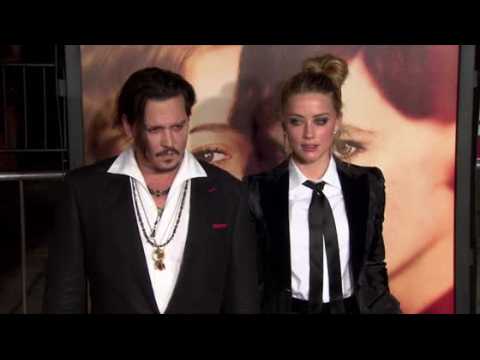 VIDEO : Johnny Depp and Amber Heard 'split over dog faeces row'