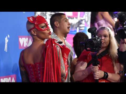 VIDEO : Amber Rose Wears Devil Inspired Outfit To MTV VMAs