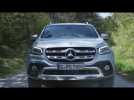 Mercedes-Benz X 350 d Diamond in Silver Metallic Driving in the country