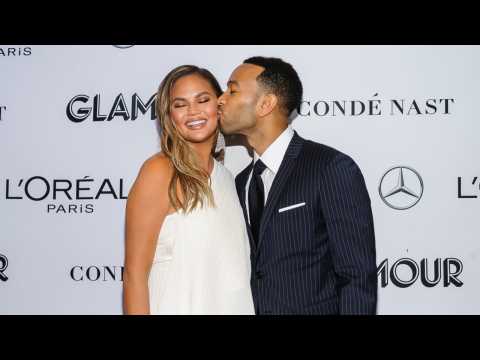 VIDEO : John Legend And Chrissy Teigen's Holiday Special Has Folks Craving A Sitcom