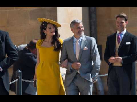 VIDEO : George Clooney a dans avec Meghan Markle lors de la rception du mariage
