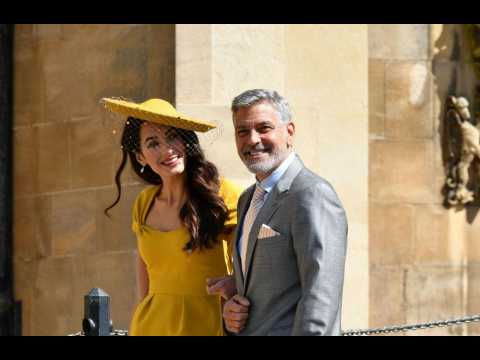 VIDEO : George Clooney poured shots at royal wedding reception