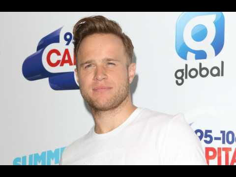 VIDEO : Louis Walsh questions Olly Murs' singing
