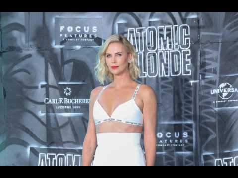 VIDEO : Charlize Theron not surprised by Harvey Weinstein allegations