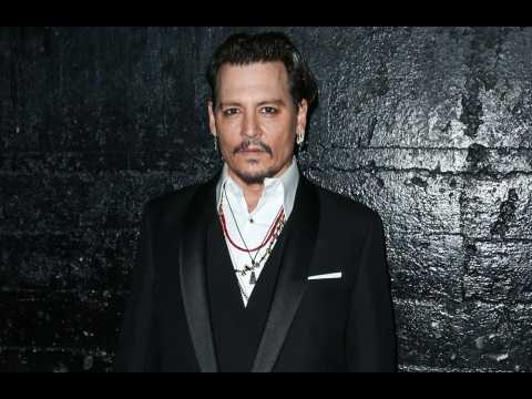 VIDEO : Johnny Depp suing former law firm