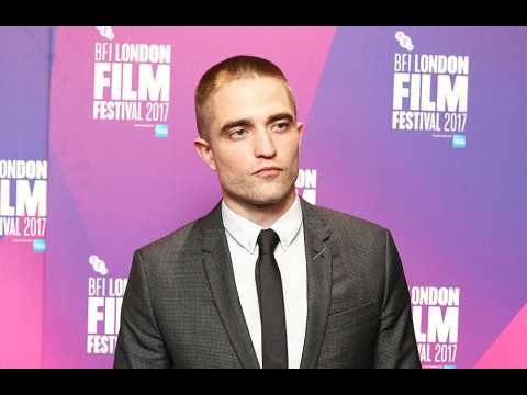 VIDEO : Robert Pattinson leaning on friend Katy Perry after his split