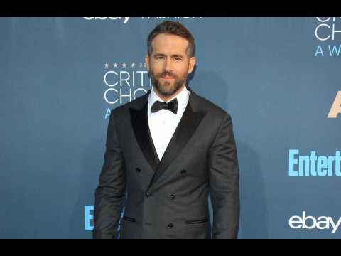 VIDEO : Ryan Reynolds jokes he's leaving his family behind
