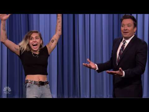VIDEO : Miley Cyrus & Jimmy Fallon Channel Rock Legends In Lip Sync Battle