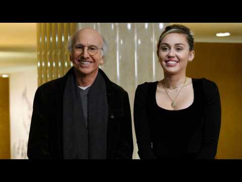 VIDEO : Larry David Reunites With Miley Cyrus In A Very ?Curb? ?SNL? Promo