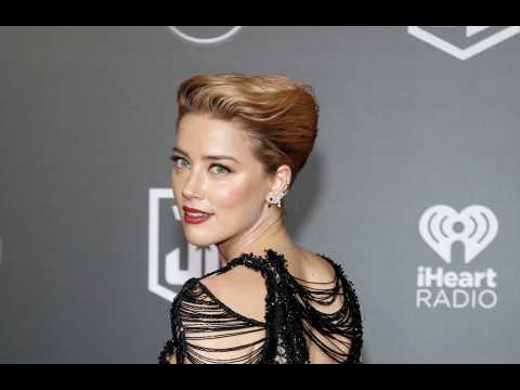 VIDEO : Amber Heard: l'argent de son divorce donn  une oeuvre de charit