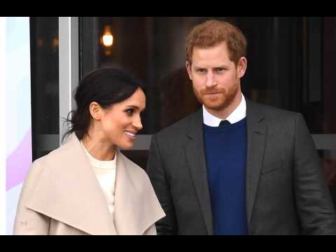 VIDEO : Prince Harry and Meghan Markle ask wedding guests to donate