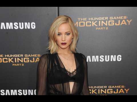 VIDEO : Jennifer Lawrence insists it was her decision not to cover up her revealing Versace dress