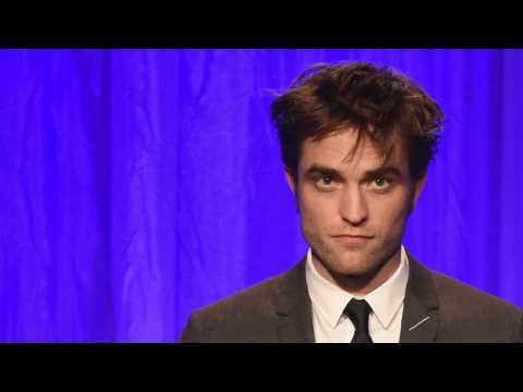 VIDEO : Robert Pattinson Clears Up Story Of Needing To Please A Dog In 'Good Time
