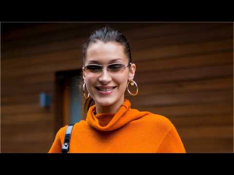 VIDEO : Bella Hadid Stepped Out In A Pumpkin-Colored Sweaterdress