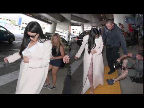 VIDEO : Kim Kardashian Narrowly Avoids Accident As She Arrives At LAX