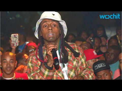 VIDEO : Birdman Reportedly Threw a Drink At Lil Wayne While He Was Performing At Club LIV