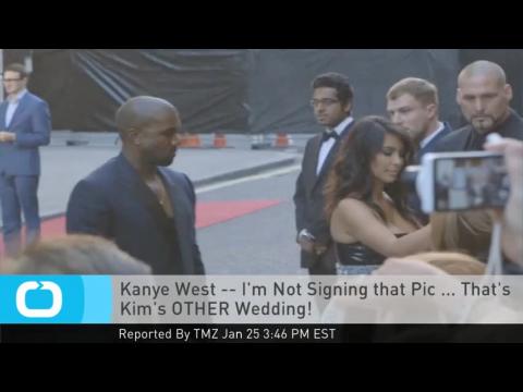 VIDEO : Kanye west -- i'm not signing that pic ... that's kim's other wedding