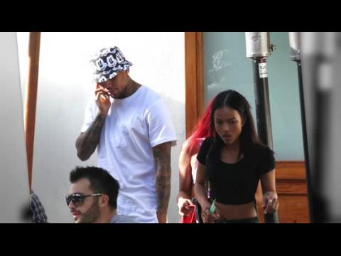 VIDEO : Chris Brown & Karrueche Tran Respond To Engagement Rumors