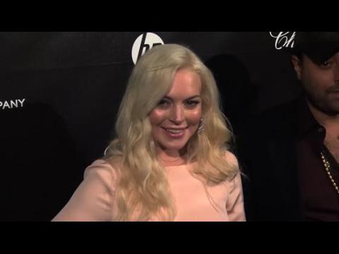 VIDEO : Lindsay Lohan Released From London Hospital After Checking in With High Fever and Joint Pain