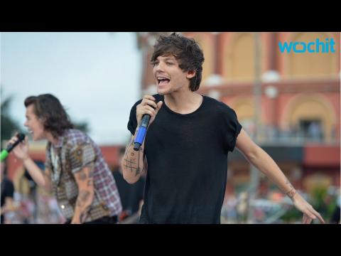 VIDEO : What Could Louis Tomlinson Possibly Be Doing in This Picture?