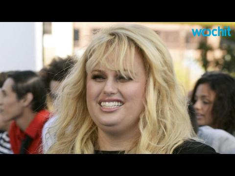 VIDEO : Rebel Wilson Gets Cozy With Mickey Gooch Jr.