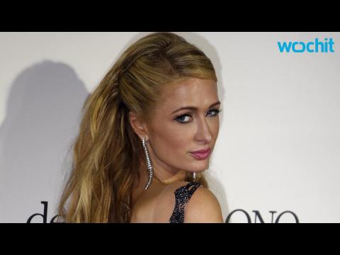 VIDEO : Leonardo DiCaprio Outbids Paris Hilton for a Chanel Purse in Cannes
