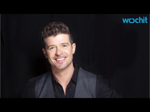 VIDEO : Robin Thicke and Young Model Girlfriend Make Red Carpet Debut Cannes