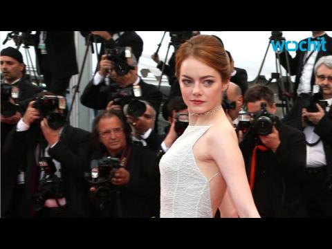 VIDEO : Emma Stone Stuns in While Lace Dior Gown at Cannes Red Carpet