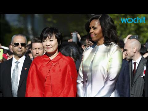 VIDEO : Michelle Obama Glistens in Chic Rainbow-Print Ensemble