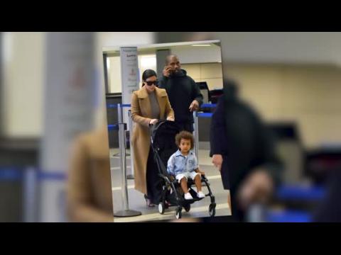 VIDEO : Influential Couple Kim Kardashian And Kanye West Arrive At LAX