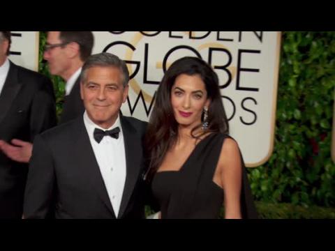 VIDEO : George Clooney Gives Fashion Advice To His Wife Amal