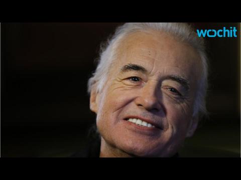 VIDEO : Robbie Williams and Jimmy Page are at War
