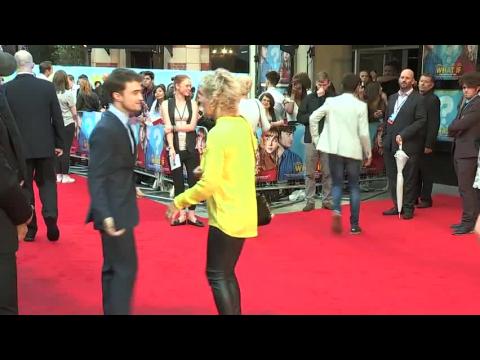 VIDEO : Daniel Radcliffe Looks Dapper At the What If Premiere Until He Gets A Touch Up From Mum