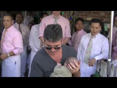 VIDEO : Simon Cowell Tweets Twin-Like Picture With Son Eric