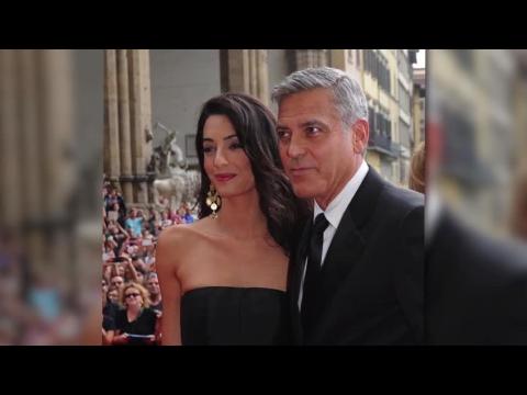 VIDEO : George Clooney & Amal Alamuddin Make Their Red Carpet Debut
