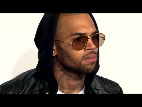 VIDEO : Chris Brown's Entourage Involved in Another Bottle Throwing Attack