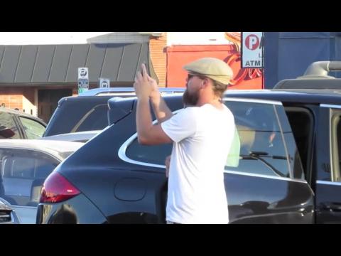 VIDEO : Leonardo DiCaprio Snaps A Selfie & Hangs Out With Tobey Maguire
