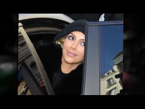 VIDEO : What Is Kim Kardashian Hiding Underneath Her Hat?