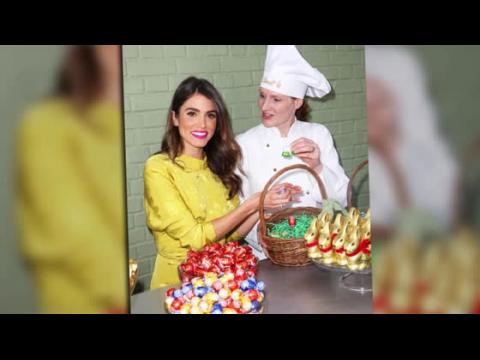 VIDEO : Nikki Reed Looks Hot Hosting Celebrity Auction With Lindt Chocolate