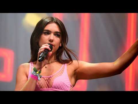 VIDEO : Dua Lipa Fights Back Against People Claiming She Altered As Baby Photo Lips