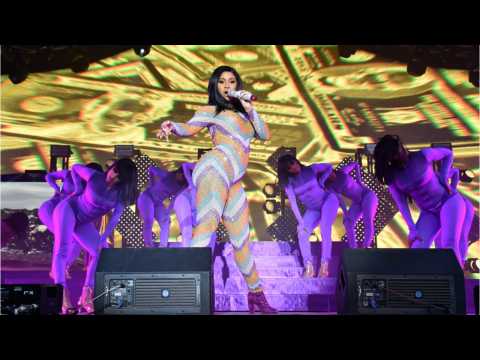 VIDEO : Cardi B Performs In A Bathrobe After Wardrobe Malfunction At Bonnaroo