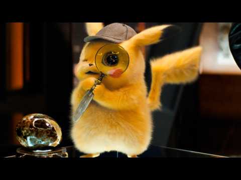 VIDEO : Detective Pikachu Artist Teases Scrapped Charizard Vs Gyarados Battle