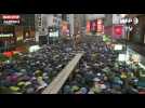 Hong Kong : Les militants prodémocratie manifestent avec leurs parapluies (vidéo)