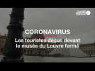 Coronavirus : les touristes déçus devant le musée du Louvre fermé
