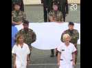 14-Juillet : Des soignants applaudis lors d'un défilé aux côtés des militaires