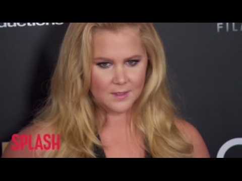 VIDEO : Amy Schumer Confirms She Is 'Still Pregnant And Puking'